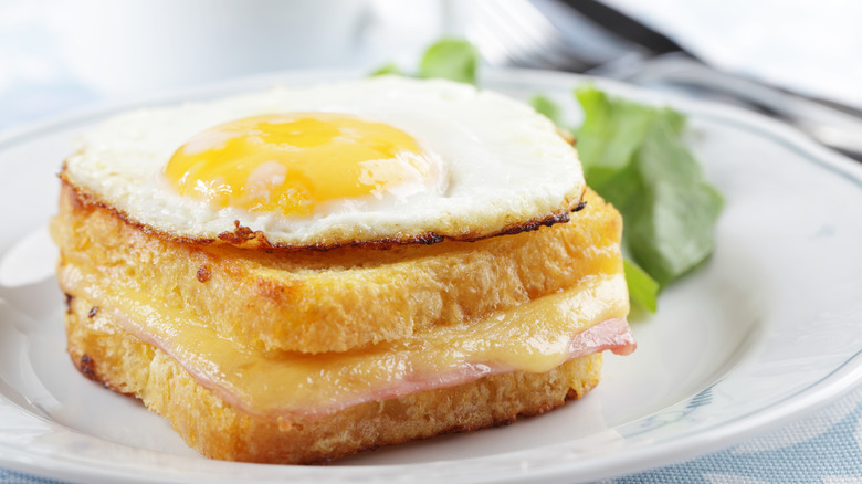 croque madame on white plate