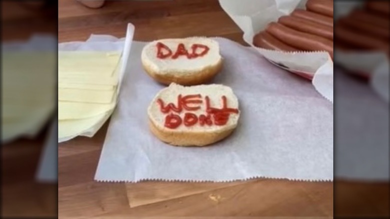 Condiment writing on burger buns 