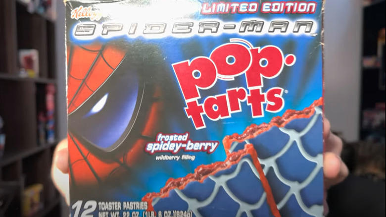 Hands holding Spider-Man Pop-Tarts box