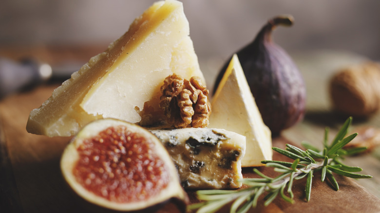 assortment of cheese and figs