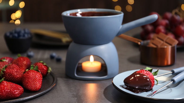 Chocolate fondue with strawberries and two forks