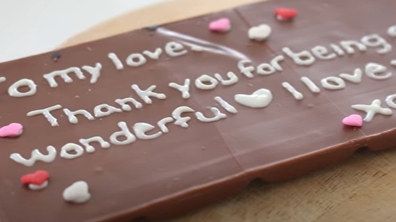 Chocolate bar with romantic message in chocolate