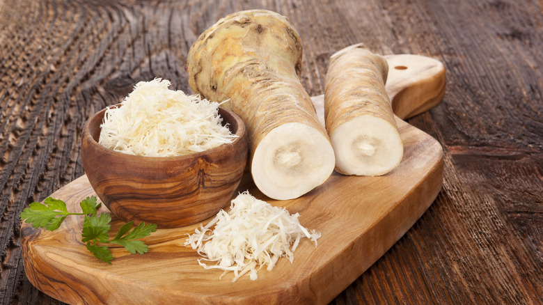 Fresh horseradish on cutting board