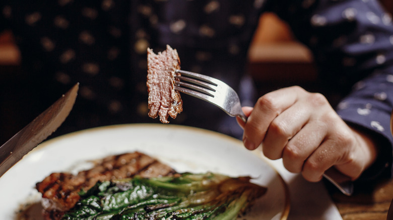 Fork with one piece of steak