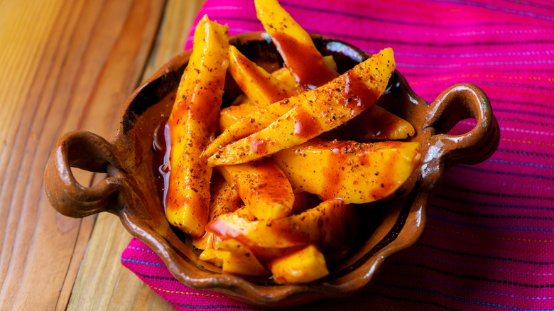 mango tropical fruit with chamoy hot sauce