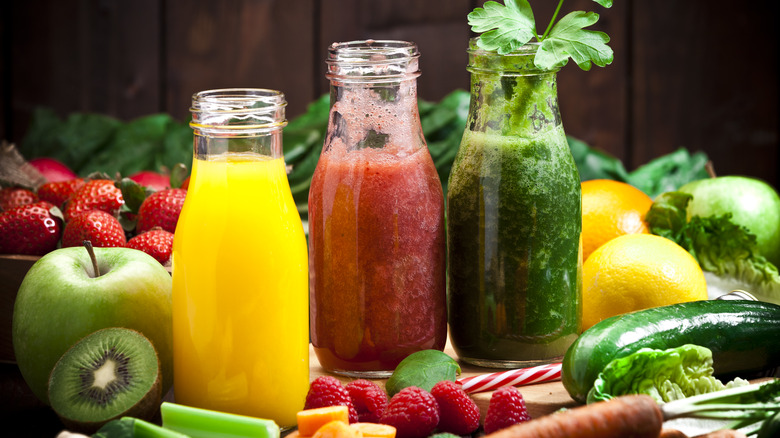 three homemade juices in bottles