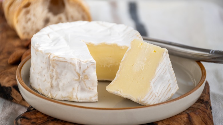 camembert with wedge cut out