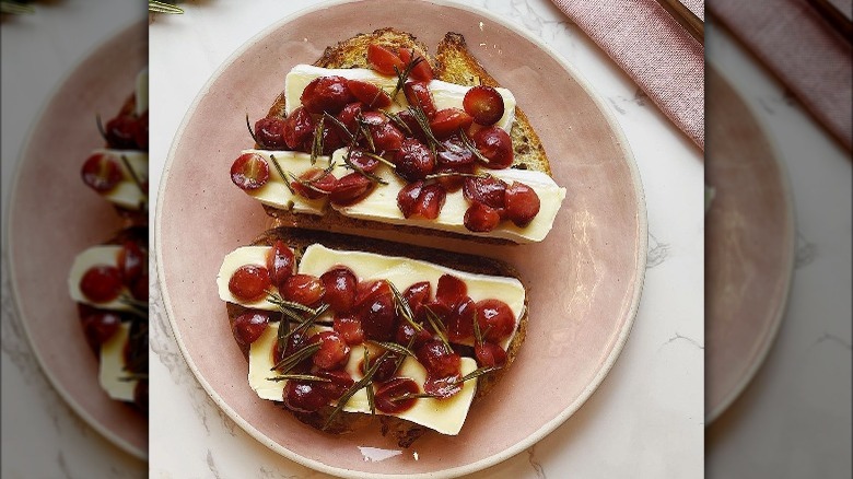 air-fried grapes and soft cheese on brown bread