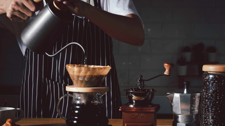 Person making pour-over coffee