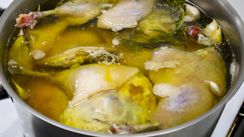 Duck confit with oil, herbs, and garlic