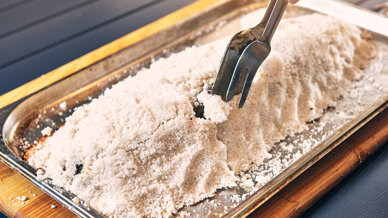 Salt-baked dish on tray