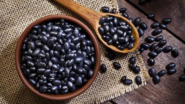 black beans in bowl and on spoon