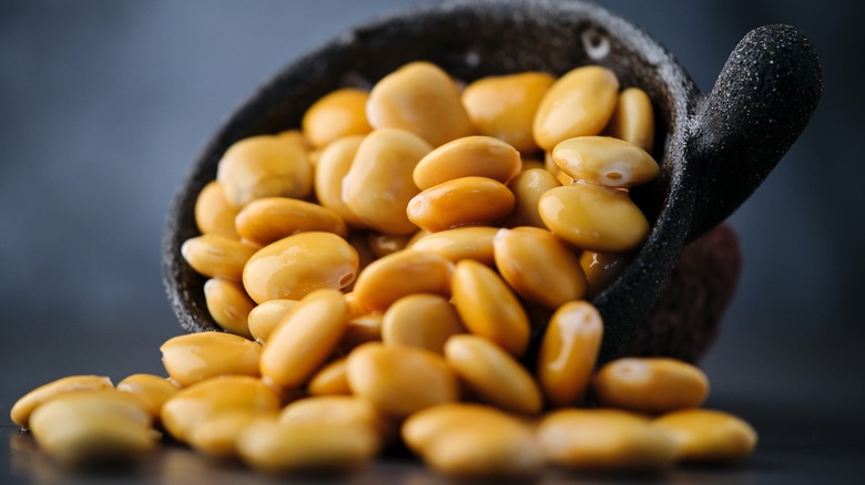 lupini beans pouring from bowl