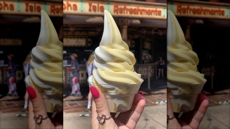 Hand holding dole whip