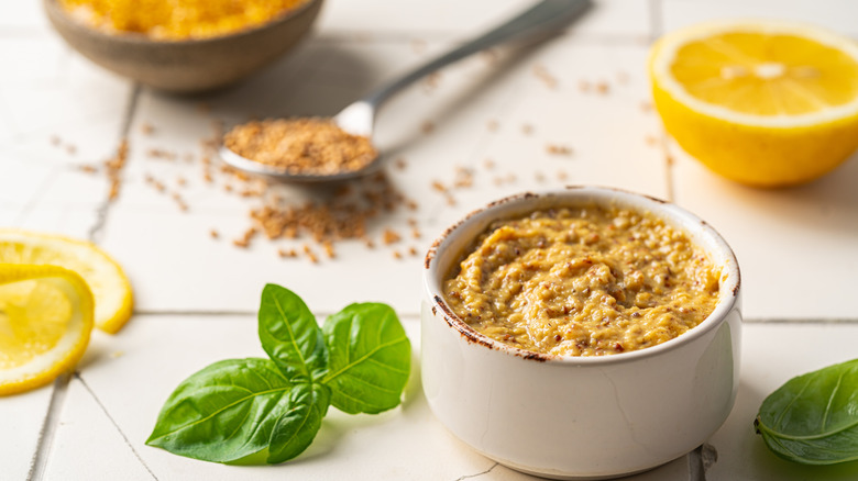 Dijon mustard in a bowl on counter