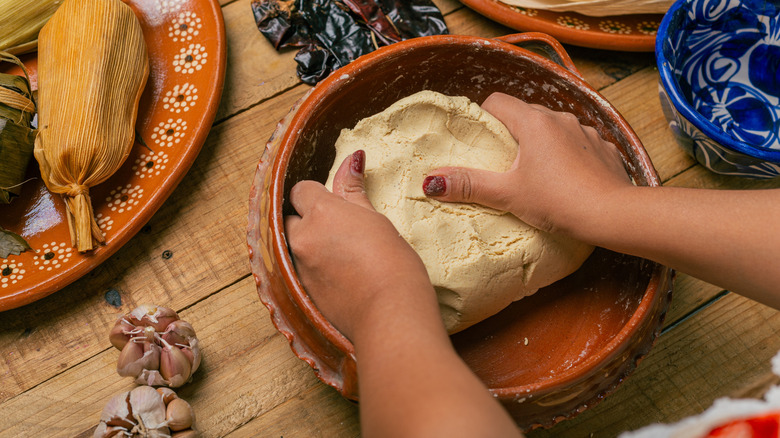 Kneading tamale masa