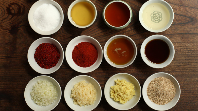 bowls of sauces, salts, and seasonings