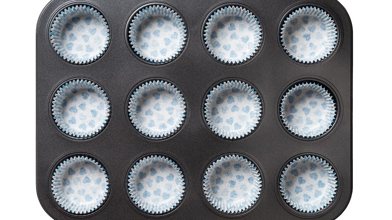 muffin pan with paper cups