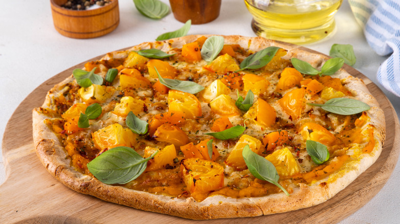 pizza with pumpkin sauce and seasonings