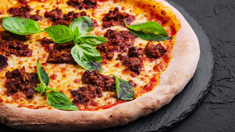 romesco sauce pizza on slate slab