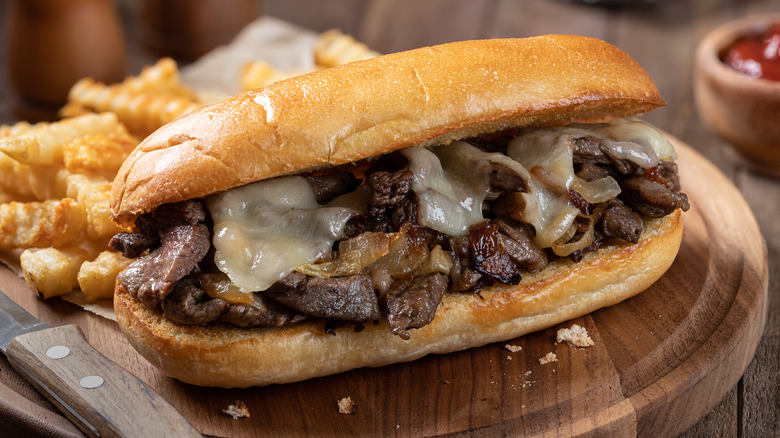 Philly cheesesteak and crinkle fries