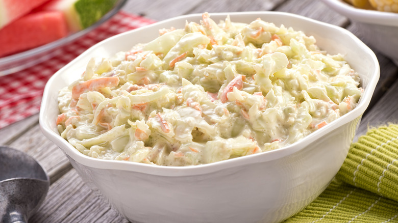 Coleslaw in a bowl on a picnic table