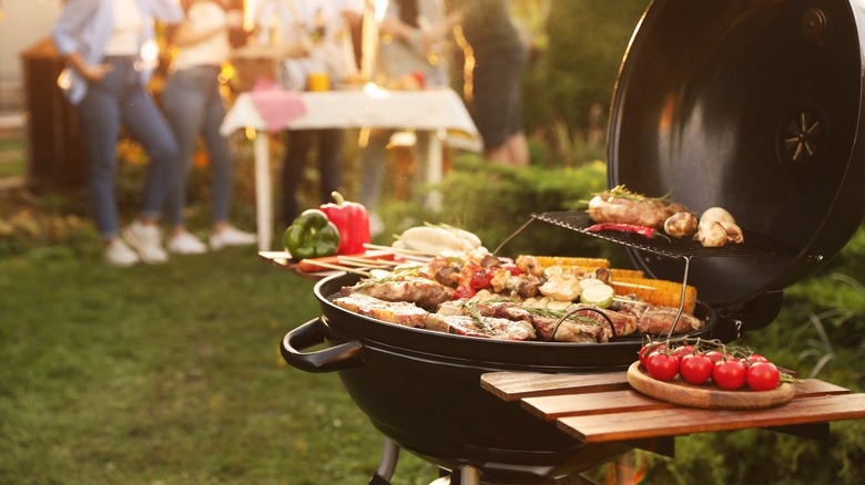 Foods crowded on a barbecue