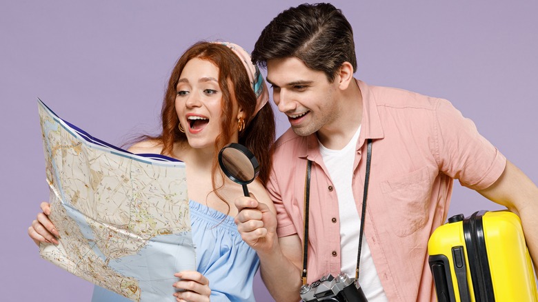 couple looking at map