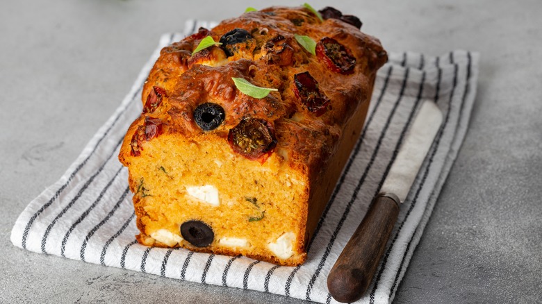 Tomato cake with cheese and olives