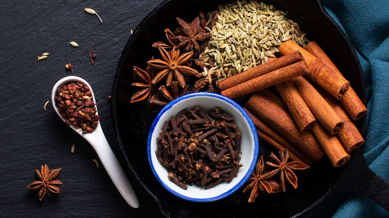 a bowl full of five whole spices