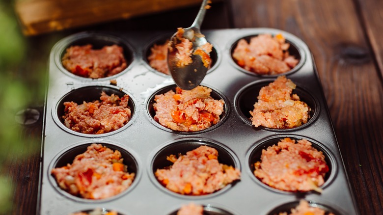 ground meat in muffin tins