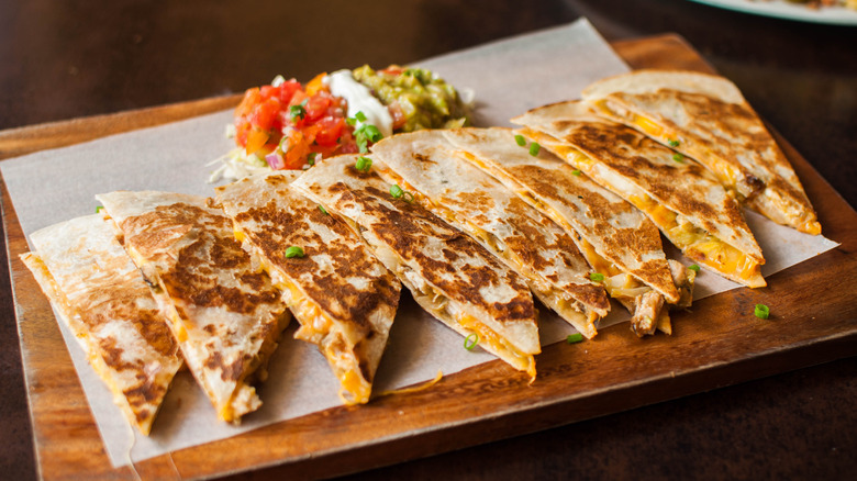 quesadillas on wooden board