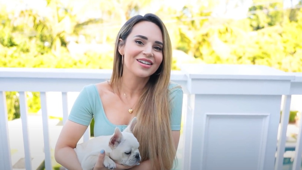 Rosanna Pansino holding her dog