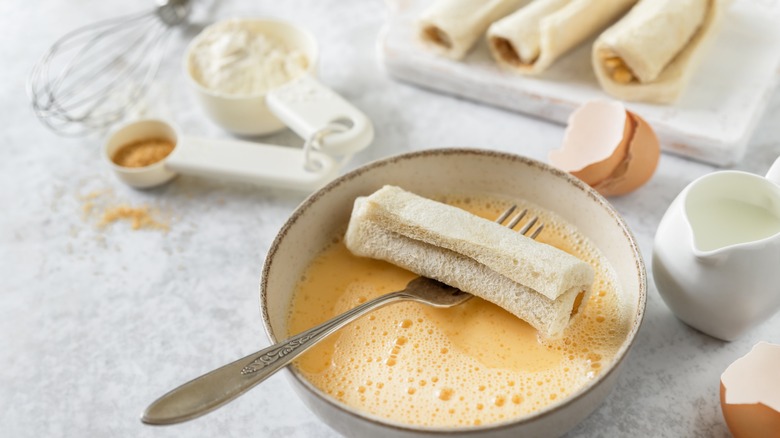 Bread rolled up with eggs and flour and milk