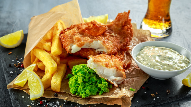 fiish and chips with mushy peas and and tartar sauce