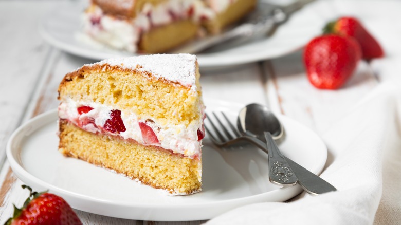 Cake slice filled with strawberries