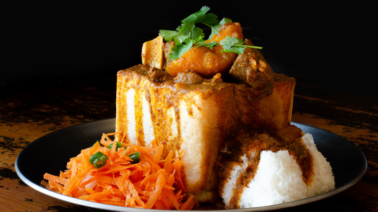 bunny chow with carrot salad 