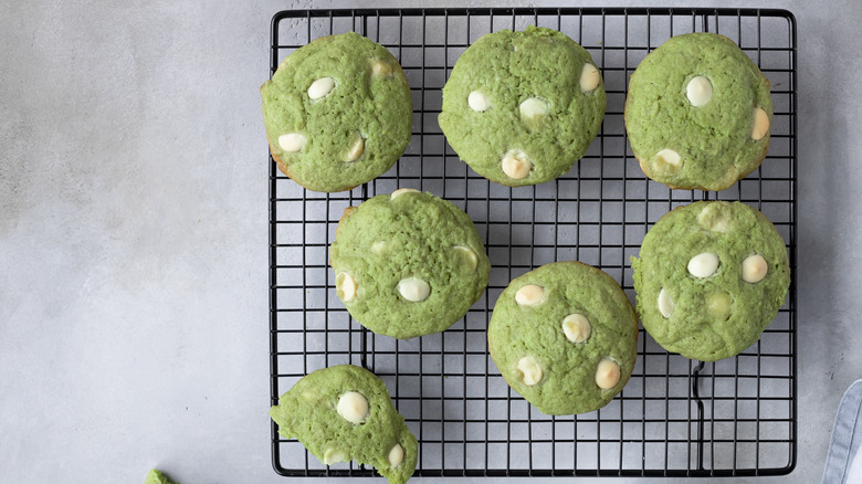 Green cookies on a cooling rack