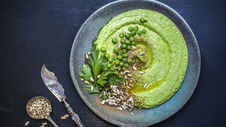 A pea dip in a bowl