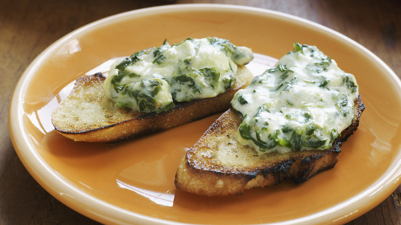 Creamed spinach on toast