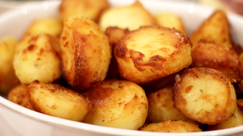 Bowl of golden roasted potatoes