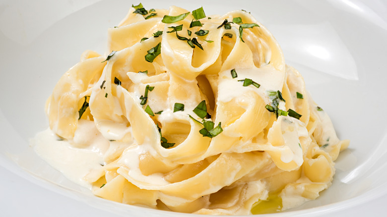 Fettuccine Alfredo in white bowl