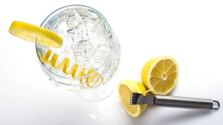 gin and tonic with lemon twist