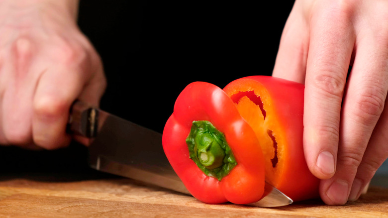 red bell pepper knife hands