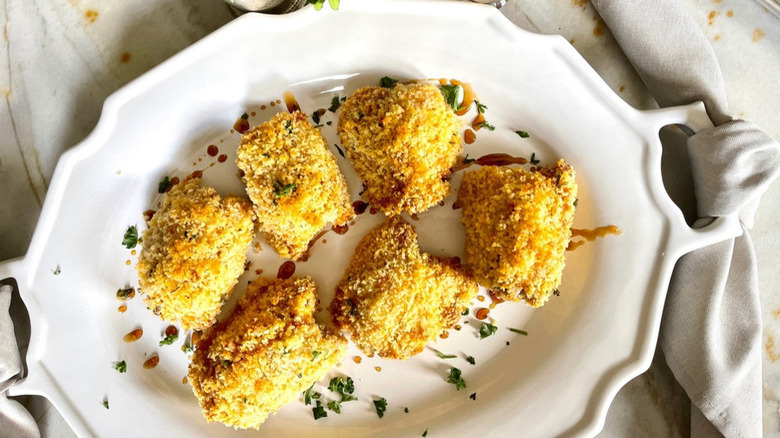 breaded chicken on white plate