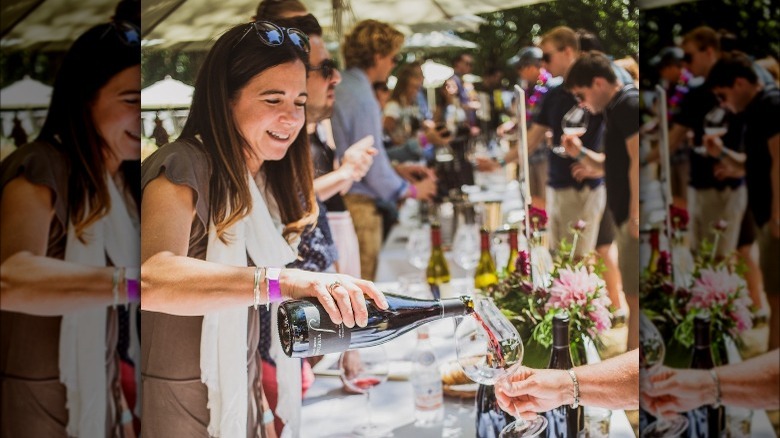 woman pouring wine