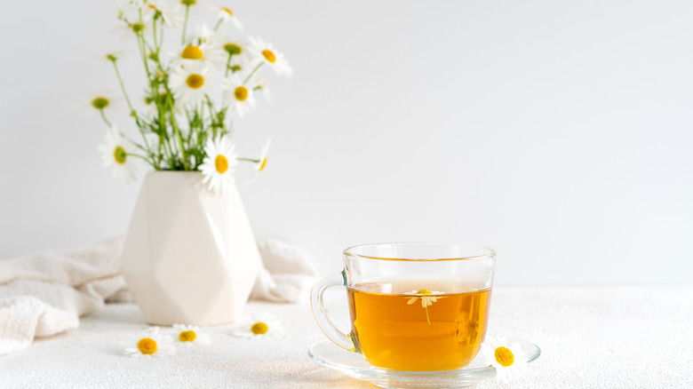 Chamomile tea in glass cup