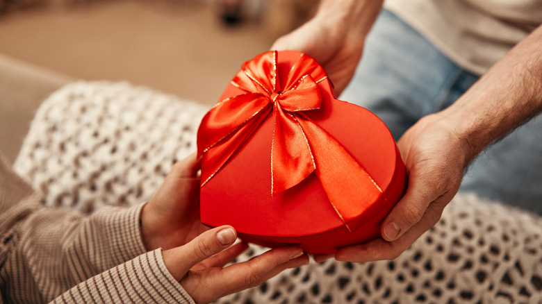 Person receiving Valentine's Day gift