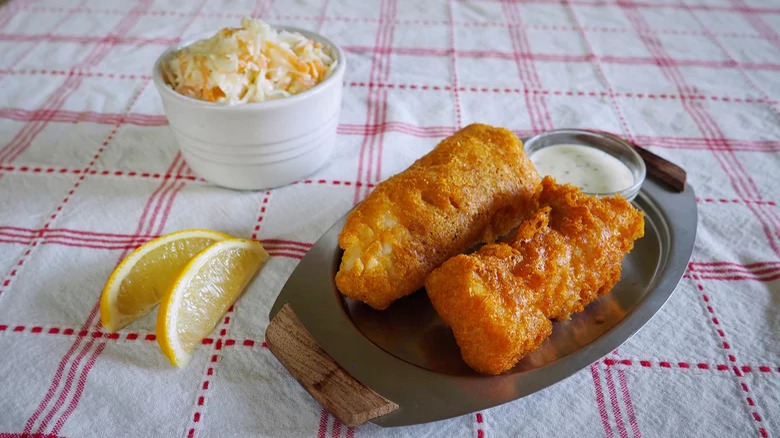 Battered fried fish with coleslaw