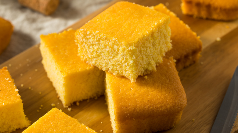 cornbread squares on wood platter